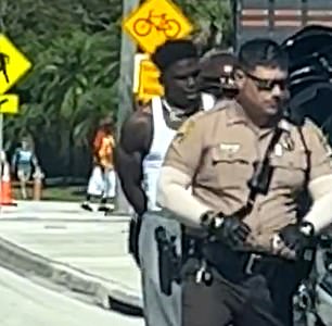 Tyreek Hill in handcuffs after being arrested by police