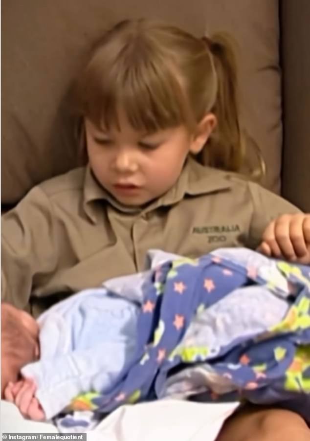 Irwin fans have been left stunned by a revelation in a resurfaced home video of the world-famous family. Pictured: Bindi Irwin, five, holds her newborn brother Robert