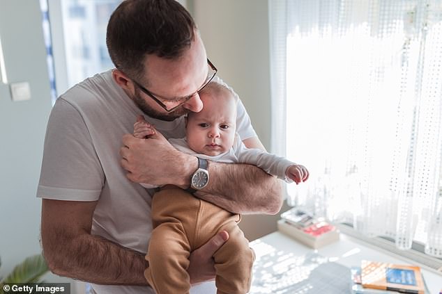 Researchers have found that fathers not only prefer the smell of their own children, but can also tell them apart based on smell (stock image)