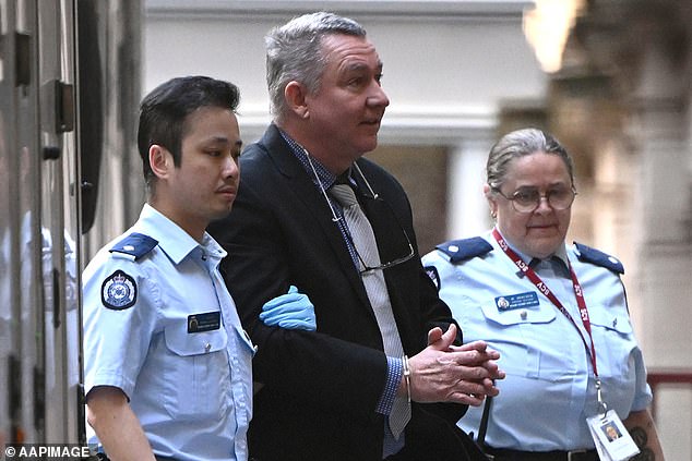 Former pilot Greg Lynn enters Victorian Supreme Court in chains on Thursday