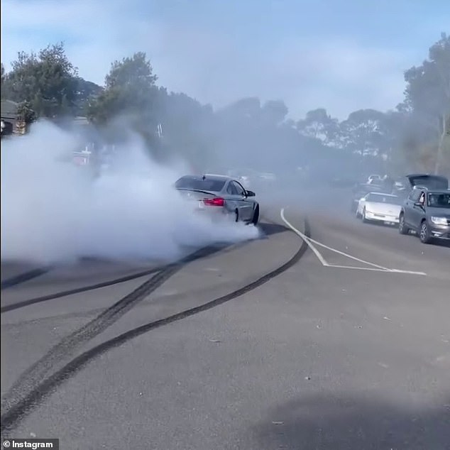 Cars were filmed performing burnouts as they left the cemetery