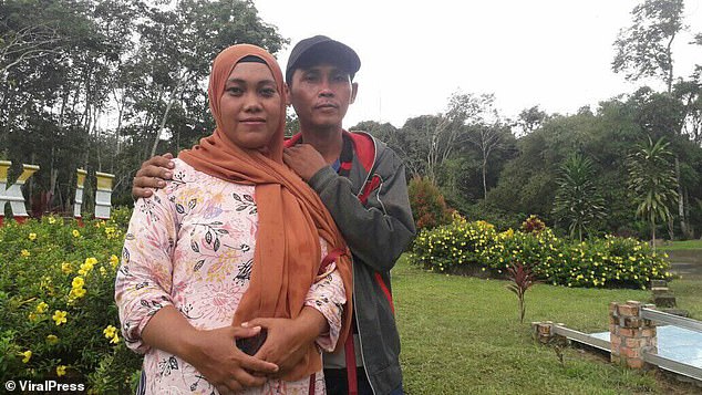 Karsini (L) was tapping rubber trees with her husband Rasum (R) when she was attacked