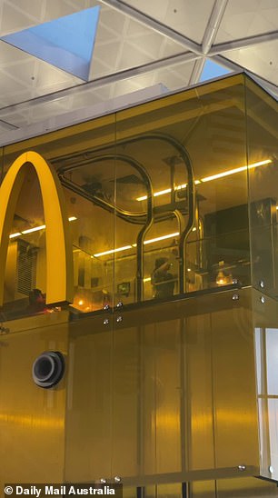 The meals at the 'unique' location are prepared in a room hidden behind yellow glass, where customers can watch their order being made in real time