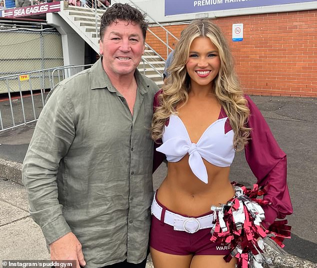 Mark Carroll (pictured with daughter Indi) says he suffers from anxiety and muscle tension as a result of an incurable brain condition and it affects his voice