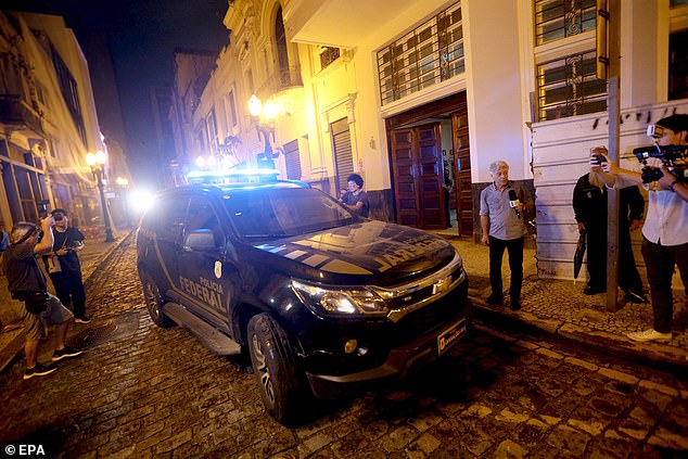 Robinho was put in this police car after his arrest in the coastal city of Santos