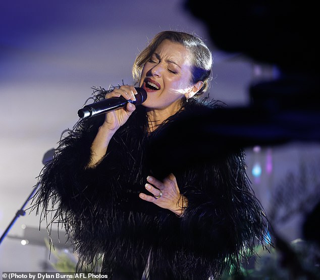 Katy will also be joined on stage by Tina Arena (pictured in April) for a surprise duet, but not all Aussies were happy with her involvement as they called on AFL fans to 'boo' her