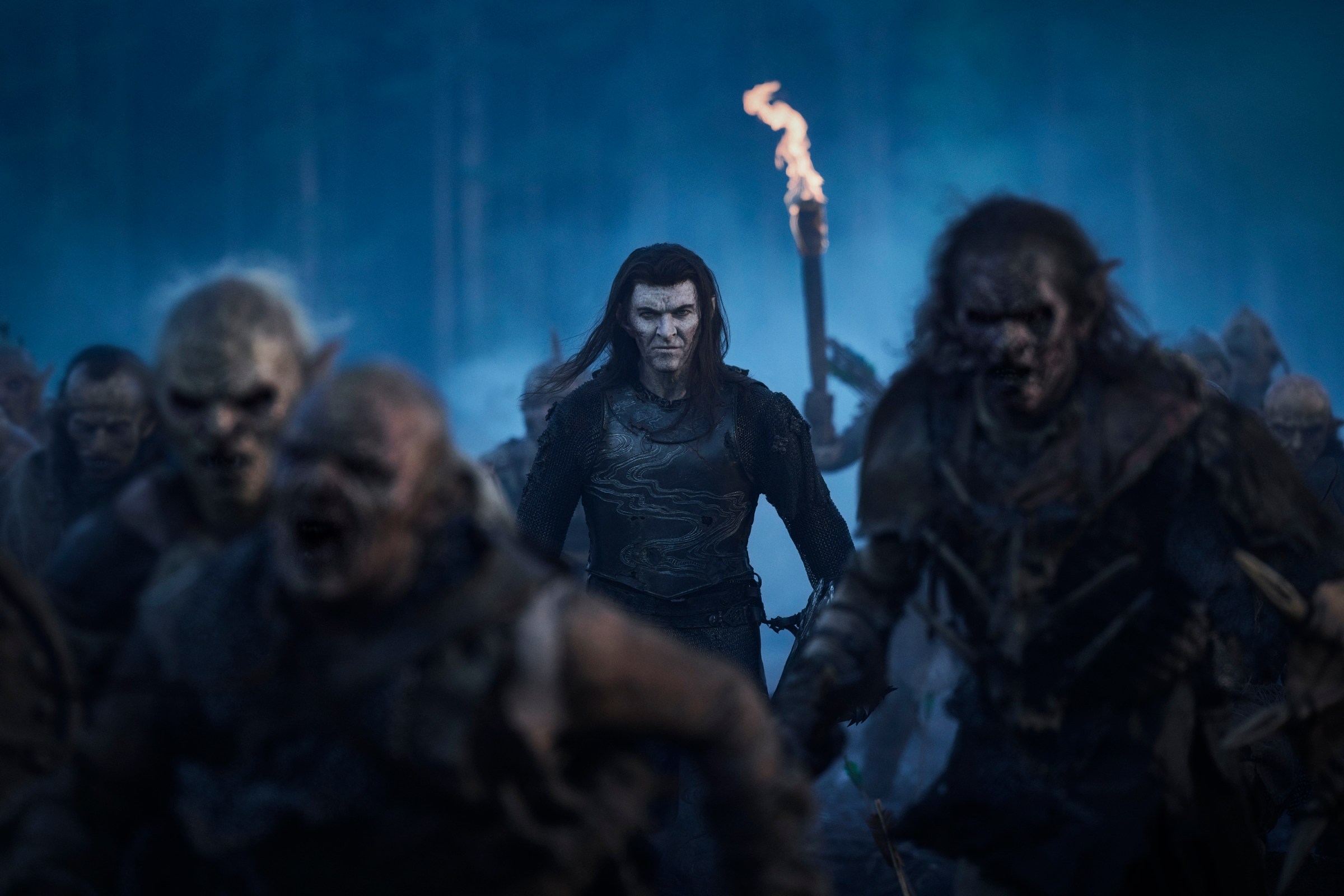 Adar walked among the orcs and headed for battle