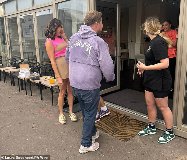 Corden was joined by Laura Davenport (left) as he spoke to locals on Barry Island