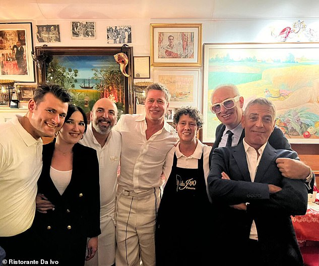 George Clooney and Brad Pitt proved they were every bit the comedy act on Sunday night when they took on the job of waiter after renting a restaurant