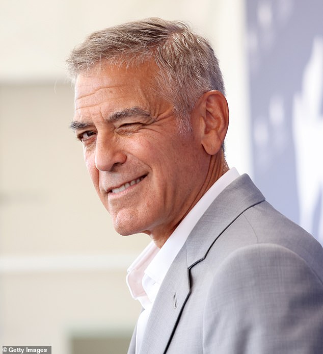 George Clooney (pictured at the Venice Film Festival) said: 'The one who should be praised is the president, who has done the most selfless thing since George Washington'