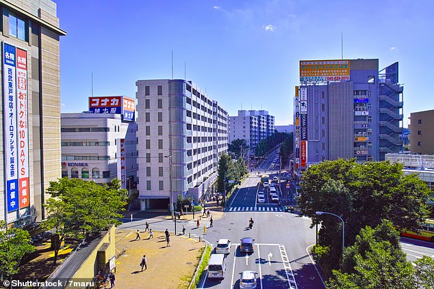 A 17-year-old girl jumped to her death and killed another woman when she landed on her in a shopping area in Japan. Pictured: Yokohama (stock image)