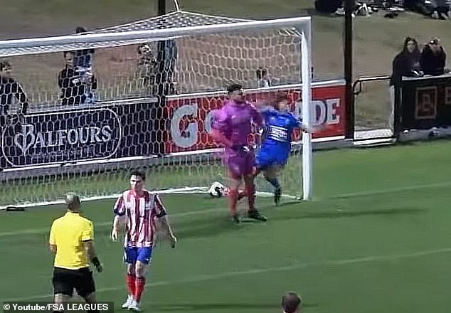 Cove FC goalkeeper Ryan Veitch dropped his shoulder against Modbury Vista's Dimos Karagiannis