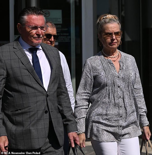 A daycare manager credited with exposing one of Australia's worst paedophiles is now fighting to clear her own name after being accused of sharing confidential material. Yolanda Borucki is pictured outside court