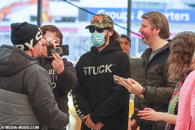 30 Seconds to Mars frontman Jared Leto, 52, (pictured) arrived incognito at Melbourne Airport on Monday, but failed to fool fans who he stopped to take photos with