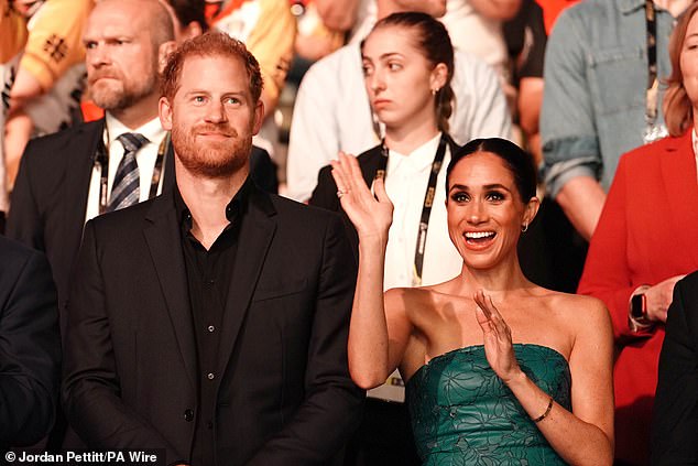 The Duke and Duchess of Sussex will remain publicly neutral during the upcoming US presidential election, it has been announced - pictured here at the Invictus Games closing ceremony