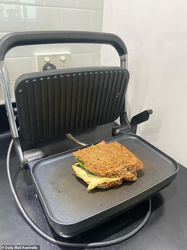 According to the user manual for a Russell Hobbs sandwich press, the green light will come on when the machine has reached operating temperature. It will then cycle on and off as the thermostat maintains the temperature