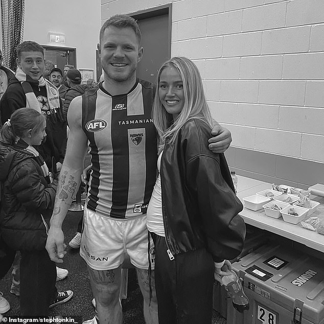 Hawthorn player Blake Hardwick and his partner Steph Tonkins (pictured together) announced they are expecting a son following the Hawks' semi-final loss to Port Adelaide