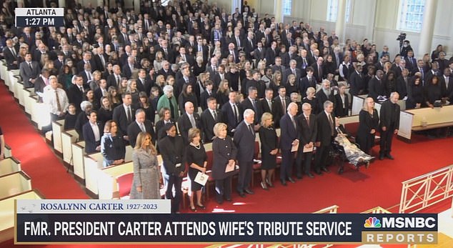 The first ladies to sit in the front row at the memorial service for Rosalynn Carter, Melania Trump sits next to Michelle Obama and in front of Kamala Harris