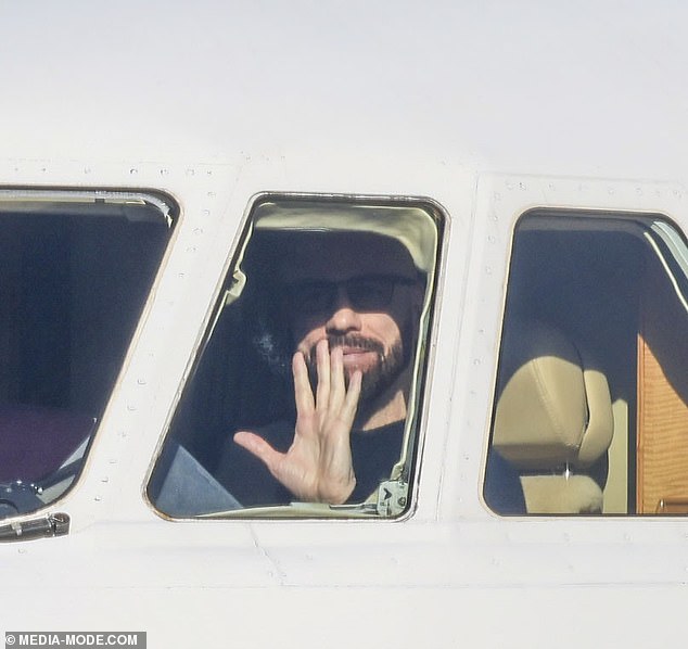 John Travolta tried to go incognito when he landed in Sydney on Wednesday. Pictured