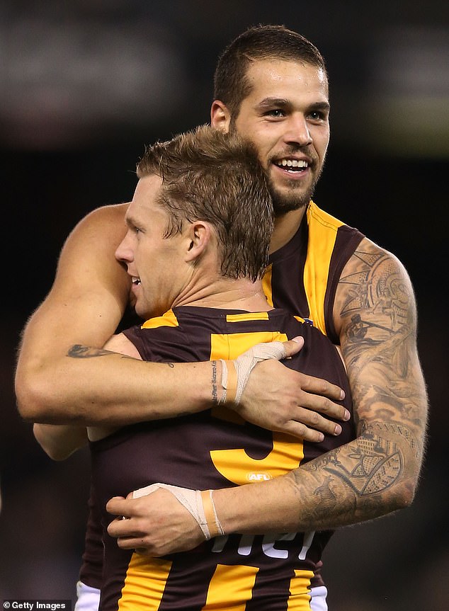 Sam Mitchell and Lance 'Buddy' Franklin became good friends during their playing days together at Hawthorn (pictured)