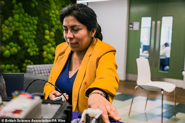 Researchers have developed a new technology that they claim can 'simulate touch as naturally as real-life sensations' (Pictured: Dr Sara Abad, a roboticist in the Department of Mechanical Engineering at University College London (UCL) at the BAMH)