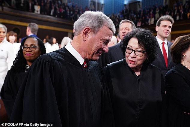 Supreme Court Chief Justice John Roberts with Justice Sonia Sotomayor