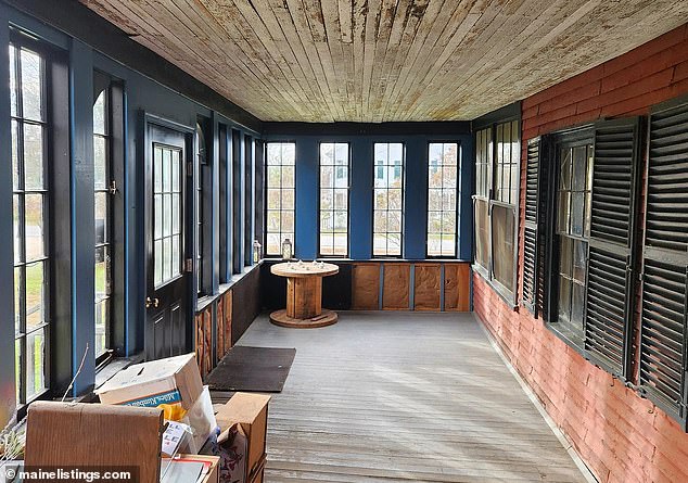 Some parts of the house are still intact, including a spacious porch with original wood and brick