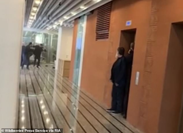 People hid in an elevator entrance as gunmen stormed Wildberries headquarters in Moscow