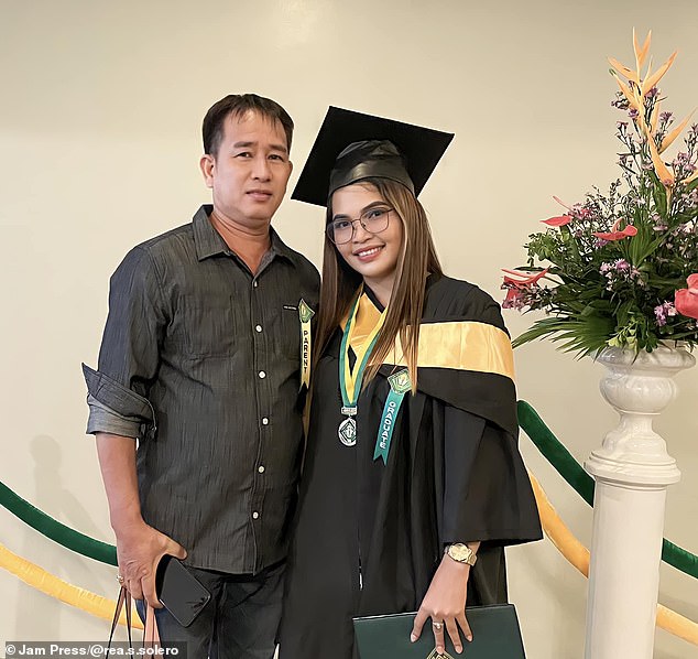 Realyn Solero, 29, says she's totally in love with Reynaldo Maquinay Jr, 53 (pictured: the couple at Realyn's graduation ceremony)