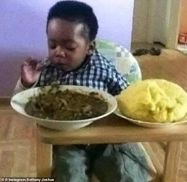 Anthony Joshua is seen here eating dinner as a child at home in Watford, Hertfordshire.