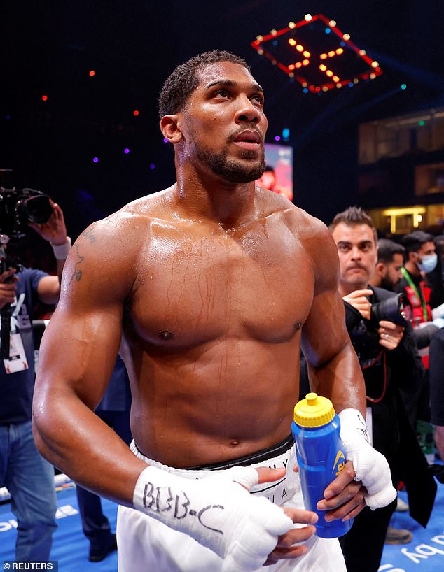 Anthony Joshua reacts after winning his fight against Francis Ngannou in Riyadh, Saudi Arabia, in March 2024