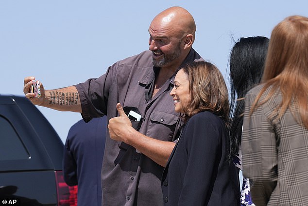 Kamala Harris took a selfie with Democratic Sen. John Fetterman as she arrived in Pennsylvania; Tuesday's debate will be held in Philadelphia