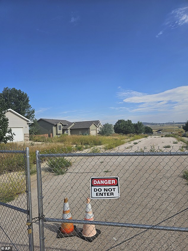 The lawsuit, filed by Hideaway Hills residents, accuses the state of reckless failure to properly stabilize a tract of land that had been used as a state-operated mine, seen here.