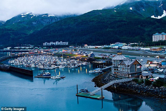 The only ways to reach Whittier, Alaska are by ferry, train, or driving through a one-way tunnel that runs directly under a glacier