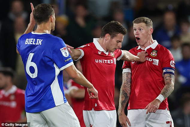 James McClean (right) was involved in several firefights during Wrexham's defeat to Birmingham