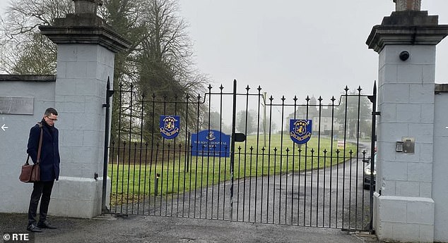 Mr Burke pictured at the gates of Wilson's Hospital School in 2023. He has repeatedly ignored a High Court order banning him from the school grounds