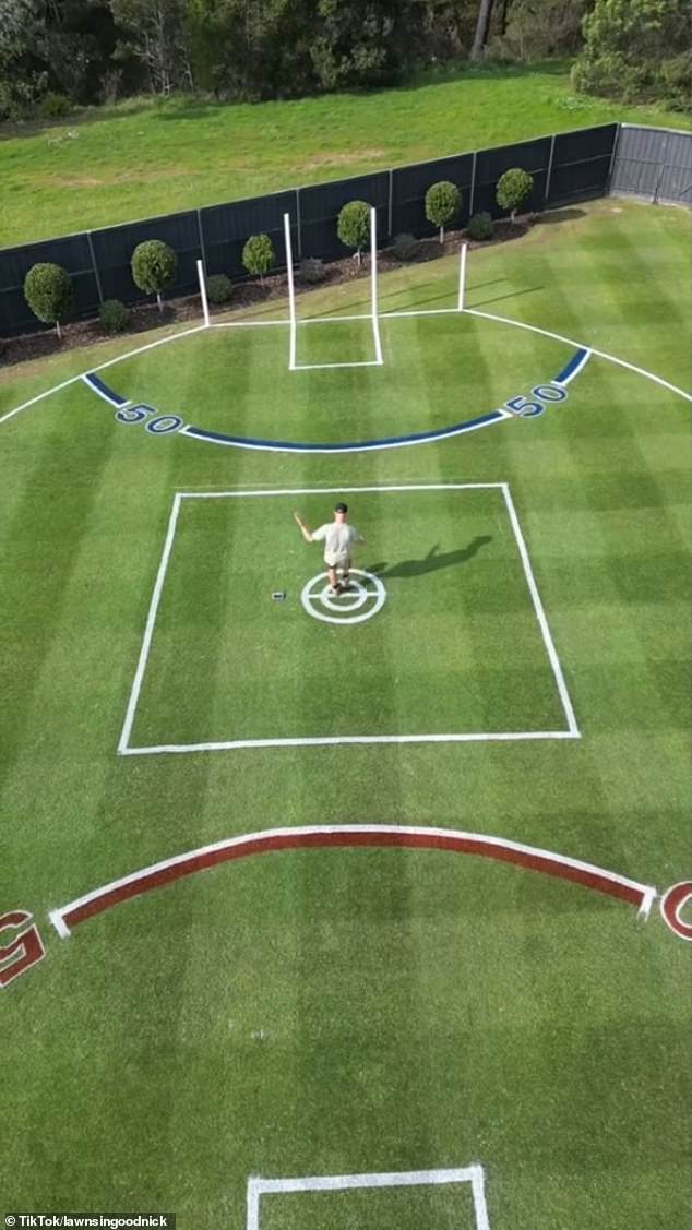 Bransgrove fires a goal in his backyard at the Melbourne Cricket Ground tribute he created ahead of Grand Final day