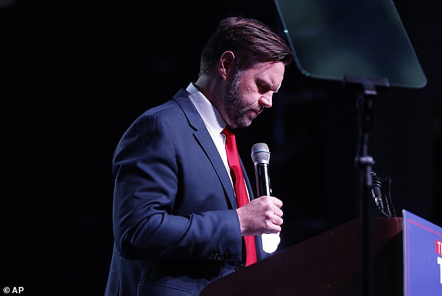 Republican vice presidential nominee Sen. J.D. Vance, R-Ohio, takes a moment of silence during a campaign event in Charlotte, N.C., Monday, Sept. 23, 2024. During the event, he spoke about religious freedoms and how Christianity is under threat in the U.S.