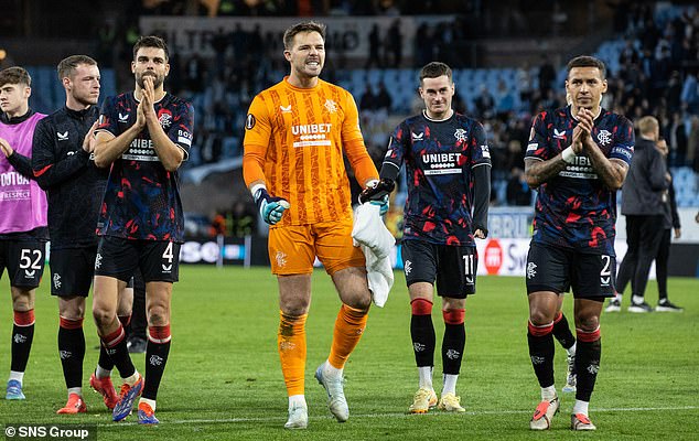 Jack Butland (centre) and James Tavernier (right) lead the celebrations after Malmö's victory