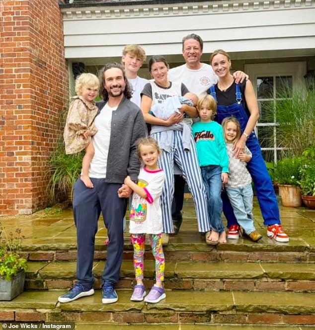 Joe Wicks shared cute family snaps as he enjoyed a bank holiday meal with Jamie and his brood on Saturday