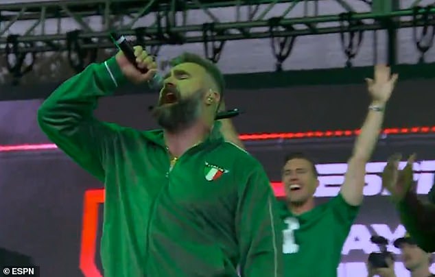 Kelce yelled into a microphone on stage as he cheered on Philadelphia Eagles fans