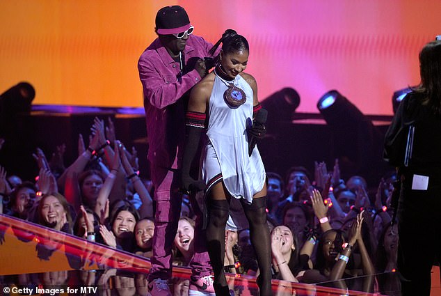 Jordan Chiles received a bronze bell from famed rapper Flava Flav at the VMAs on Wednesday