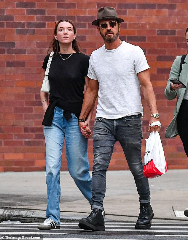 The loved-up couple appeared to be running errands, as the Beetlejuice Beetlejuice star carried a white plastic bag