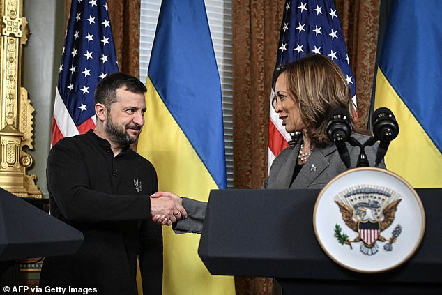 Ukrainian President Volodymyr Zelensky and Vice President Kamala Harris shake hands during a meeting at the White House