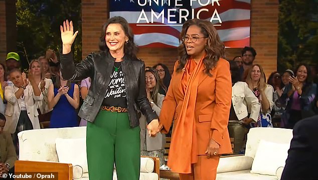 Oprah Winfrey (right) got Michigan's popular Democratic Governor Gretchen Whitmer (left) to warm up the audience with her Thursday night as she took over an Oakland County sound stage to essentially recreate her popular daytime talk show