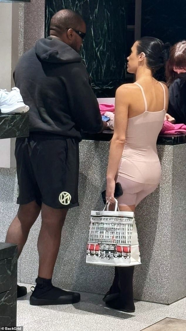 Kanye West and his wife Bianca Censori were spotted in Japan again on Friday, and once again Bianca wore a crazy outfit that would be more suited to a boudoir than a public one