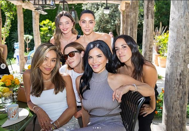 Kim was seen next to Miranda Kerr, top left