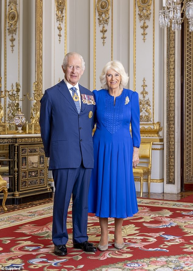 Official portrait of King Charles and Queen Camilla for the upcoming tour of Australia, showing him wearing the Sovereign's Badge of the Order of Australia and the Queen wearing the Wattle Brooch presented to Queen Elizabeth on her first visit as monarch in 1954.