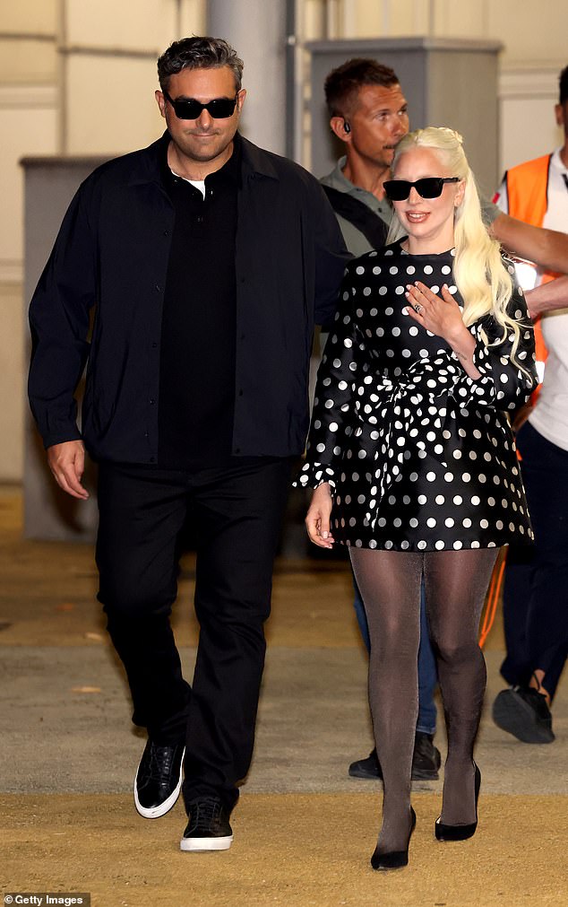 Lady Gaga and her fiancé Michael Polansky put on an amorous display Monday as they arrived in Italy for the 81st annual Venice Film Festival