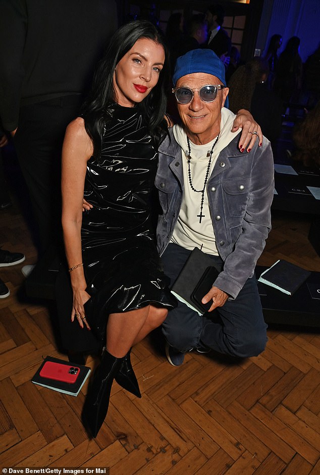 Liberty Ross, 45, cuddled up with her billionaire husband Jimmy Iovine, 71, as they made a rare appearance together at the MAINS by Skepta Runway Show during London Fashion Week on Saturday